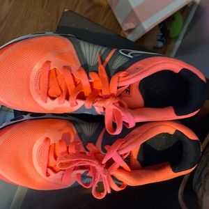 Very slightly 8.5 Nike Airmax. Gray, black and orange color.